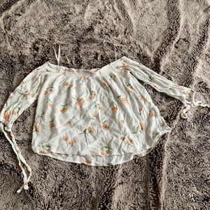 Off the shoulder ruffle shirt